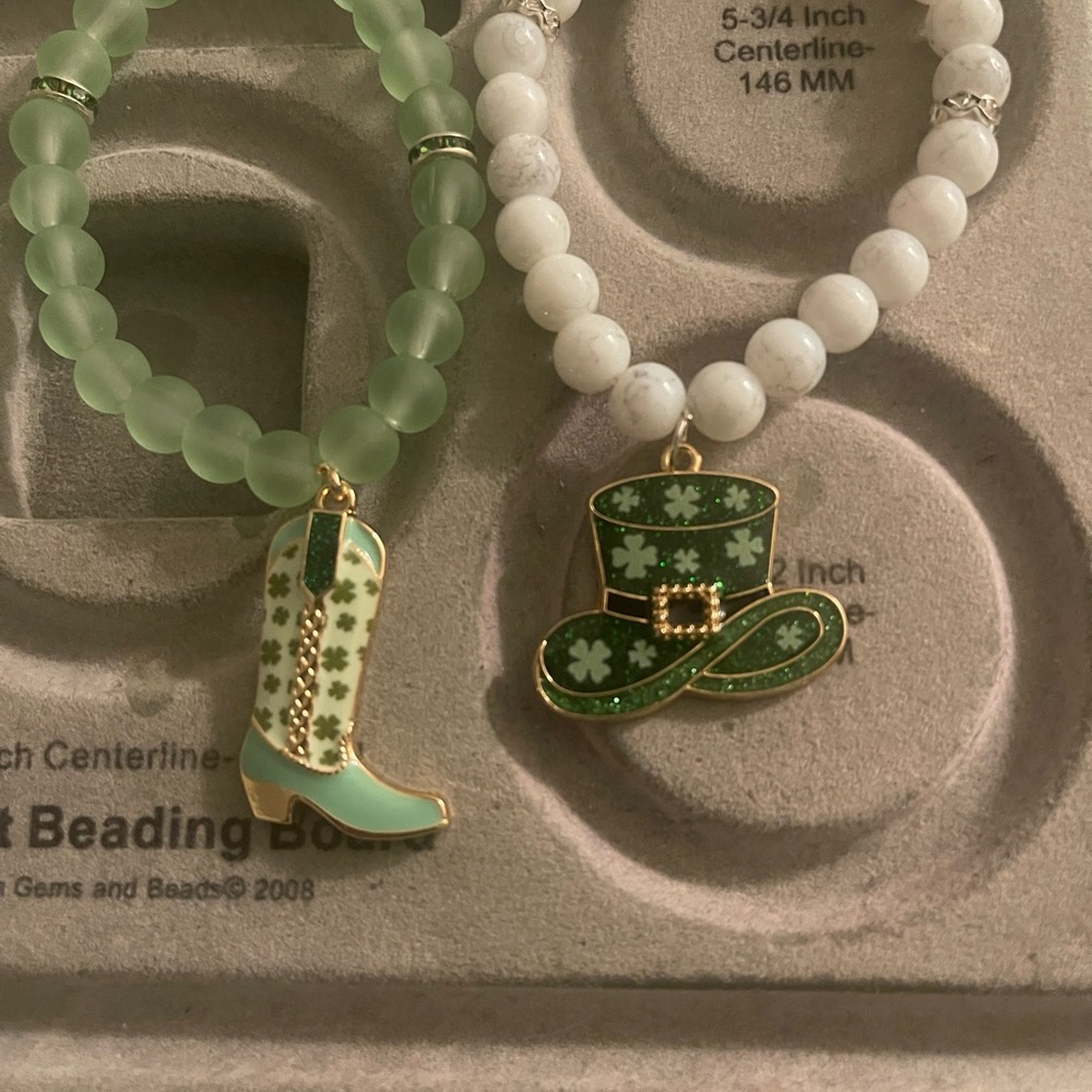 Green and White Beaded Bracelets with Boot and Hat Charms